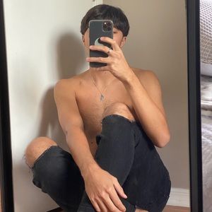 Black ripped PULL&BEAR jeans from Spain.